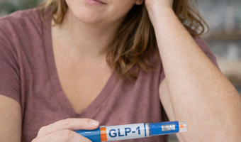 A woman contemplating using GLP-1